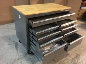 46 in. W x 24 in. D Standard Duty 9-Drawer Mobile Workbench Tool Chest with Solid Wood Top in Gloss Black by Husky Customer Returns See Pictures