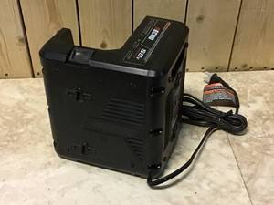 lot 12 image: ECHO 58-Volt Lithium-Ion Charger &nbspCustomer Returns See Pictures