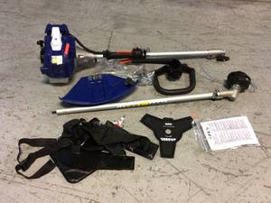 lot 51 image: Badger 26 cc 2-Cycle 2-in-1 Gas Full Crank Straight Shaft Grass Trimmer with Brush Cutter Blade and Bonus Harness &nbspCustomer Returns See Pictures