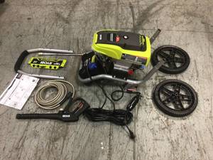 lot 103 image: 2300 PSI 1.2 GPM High Performance Electric Pressure Washer with 12 in. Surface Cleaner by RYOBI Customer Returns See Pictures