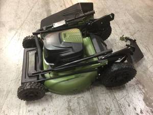 lot 113 image: 62V Cordless 3-in-1 High Wheel Push Walk Behind Mower, Brushless 22 In. Cutting Width with 4Ah Battery and Rapid Charger by Green Machine Customer Returns See Pictures