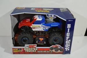 lot 60 image: NEW New Bright Bigfoot 4x4x4 Remote Control Monster Truck