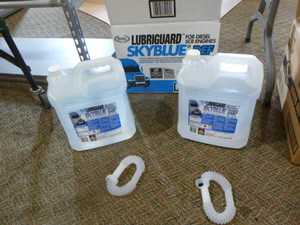 lot 36 image: 2 Bottles of Warren Lubriguard Skyblue Diesel Exhaust Fluid