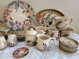 lot 174 image: Colorful Gibson Dinnerware Service  31 Pieces
