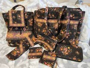 lot 77 image: Vera Bradley Collection  Yellow Geo & Floral Print, 8 pieces