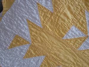 lot 152 image: Antique Yellow and White Feedsack Sawtooth Quilt