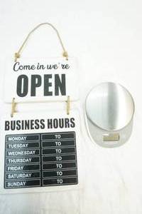scale and business open sign