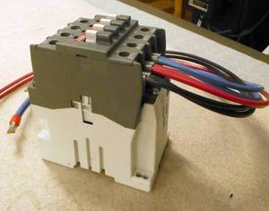 lot 24 image: 3 Allen Bradley contactor starters with rail module