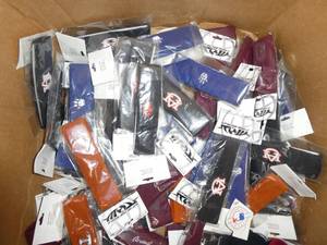 lot 57 image: 35 athletic headbands with various teams on them