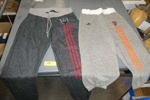 lot 73 image: Two 34 length pants - no size tags but measures 13 across