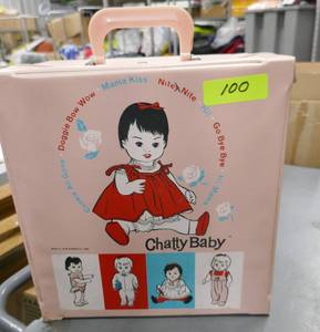 lot 100 image: Vintage Chatty Baby carrier