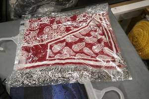 lot 154 image: 8 New Sports team fashion scarfs, measure 28 wide x 74 long, four of the timberwolves