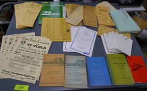 lot 189 image: Great Northern Railway ads, schedules, locomotive engine books, ticket envelopes etc