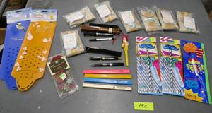 lot 192 image: 7 luggage tags, 2 bird feeders, pens and pencils