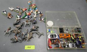 lot 194 image: vintage toys, the tin indian and horses are poor condition but the plastic football players are very good, plus a box of electric car parts