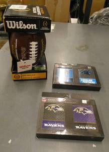 lot 217 image: 4 decks of playing cards and a mini football