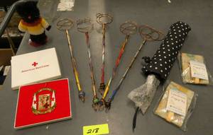 lot 218 image: 5 decorative suncatchers Umbrella, luggage tags, a boyds bear and a Red Cross ornament