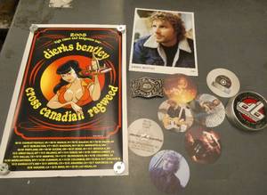 lot 231 image: Dierks Bentley poster, belt buckle, photo and drink coasters