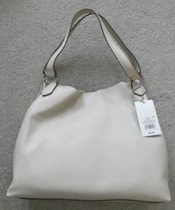 lot 240 image: New handbag with a large center zipper pouch and 2 large side pouches and spots for glasses and phone