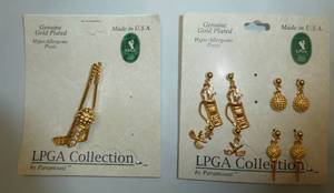 lot 247 image: LPGA Collection pin and 4 sets of earrings all with golf theme