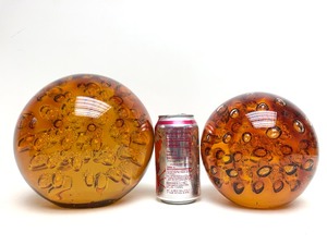 lot 9 image: 2 LARGE Vintage Amber Glass OrbsPaperweights