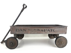 lot 87 image: Rare Antique DAN PATCH Steel Wagon