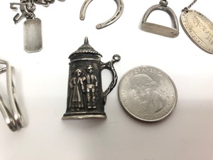 lot 148 image: Group of Vintage Sterling Silver Charms & Chain