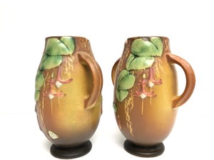 lot 101 image: Matching Pair of Vintage ROSEVILLE Art Pottery Handled Vases