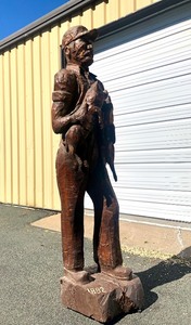 lot 251 image: HUGE Carved Pig Farmer Wood Statue