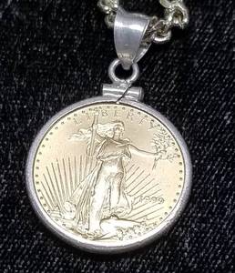 1999 US $10 GOLD EAGLE � OZ .999 FINE GOLD IN NECKLACE