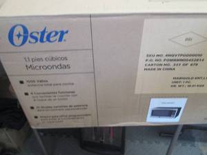 Oster 1.1 Cu. Ft. 1000-Watt Counter...