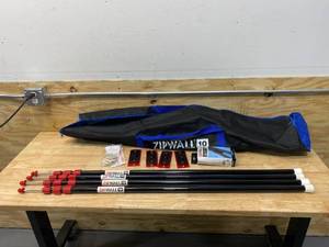 lot 22 image: ZIPWALL ZP4 Contains 4 10 ft. Steel Spring Loaded Poles 4-Heads, 4-Plates, 4-Tethers, 4-Grip Disks, 2-Zippers and 1-Carry Bag