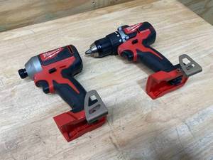 lot 41 image: MILWAUKEE M18 18-Volt Lithium-Ion Brushless Cordless 14 in. Impact Driver and M18 18-Volt Lithium-Ion Brushless Cordless 12 in. Compact DrillDriver (Tool Only)