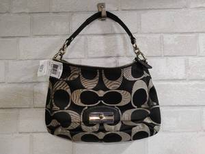 lot 124 image: Coach Handbag with Retail Tag