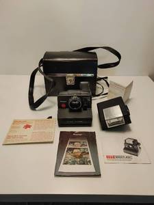 lot 153 image: Polaroid Land Camera Pronto ITT Magicflash Camera