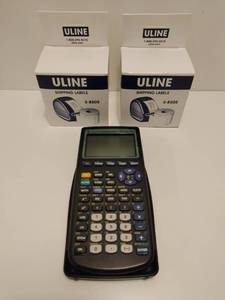 lot 157 image: Texas Instruments TI-83 Plus Calculator & ULINE Shipping Labels