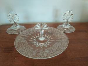 lot 67 image: Collection Of  Fostoria serving pieces Crystal Platter And Two Candlesticks