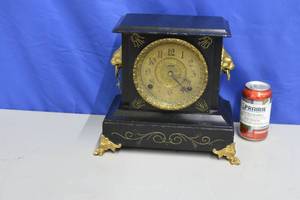 lot 4 image: Black and Gold Lion Wind up Clock