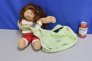 lot 15 image: Cabbage Patch Kids Diaper Bag and large Cabbage Patch Kid
