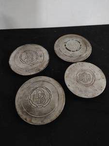 lot 252 image: Four Vintage Hub Caps