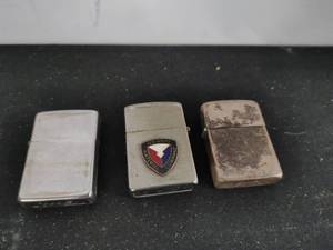 lot 96 image: Three Vintage Lighters