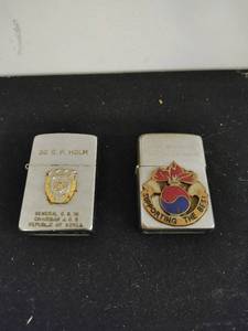 lot 99 image: Two Military Lighters