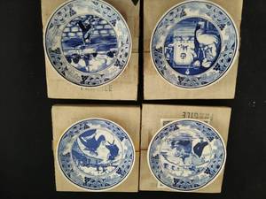 lot 31 image: Four Blue Delft Collector Plates