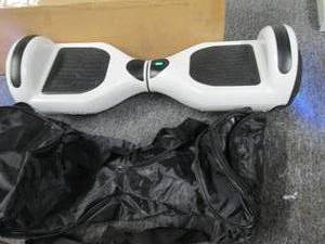 white NHT pro hoverboard powers on ...