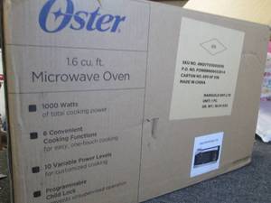 oster 1.6 cu.ft microwave oven 1000...