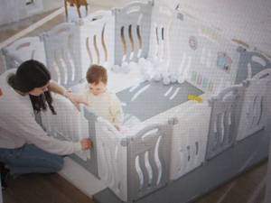 2 boxes of foldable safety gate...