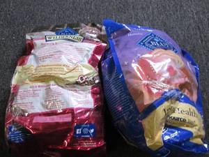 2 bags of cat food 14lb bag and 1...