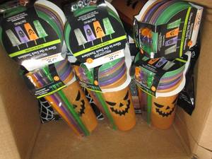 box of halloween cups and table clo...