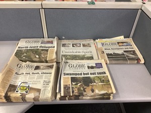 lot 1-097 image: Vintage Newspapers (2008 Flood)