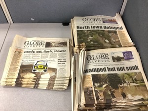 lot 1-098 image: Vintage Newspapers (2008 Flood)
